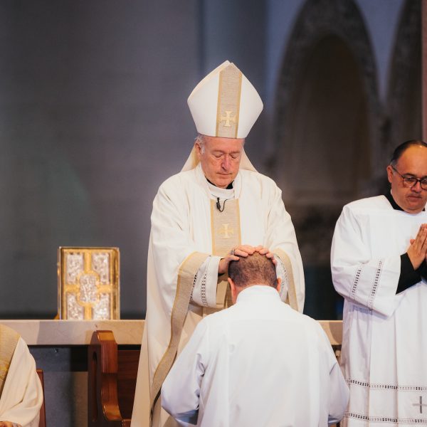 Cardinal Robert W. McElroy ordained Sean Thomas Embury to the transitional diaconate on Dec. 2, 2023, at The Immaculata Church. (Photo by Leonardo Enrique Fonseca.)